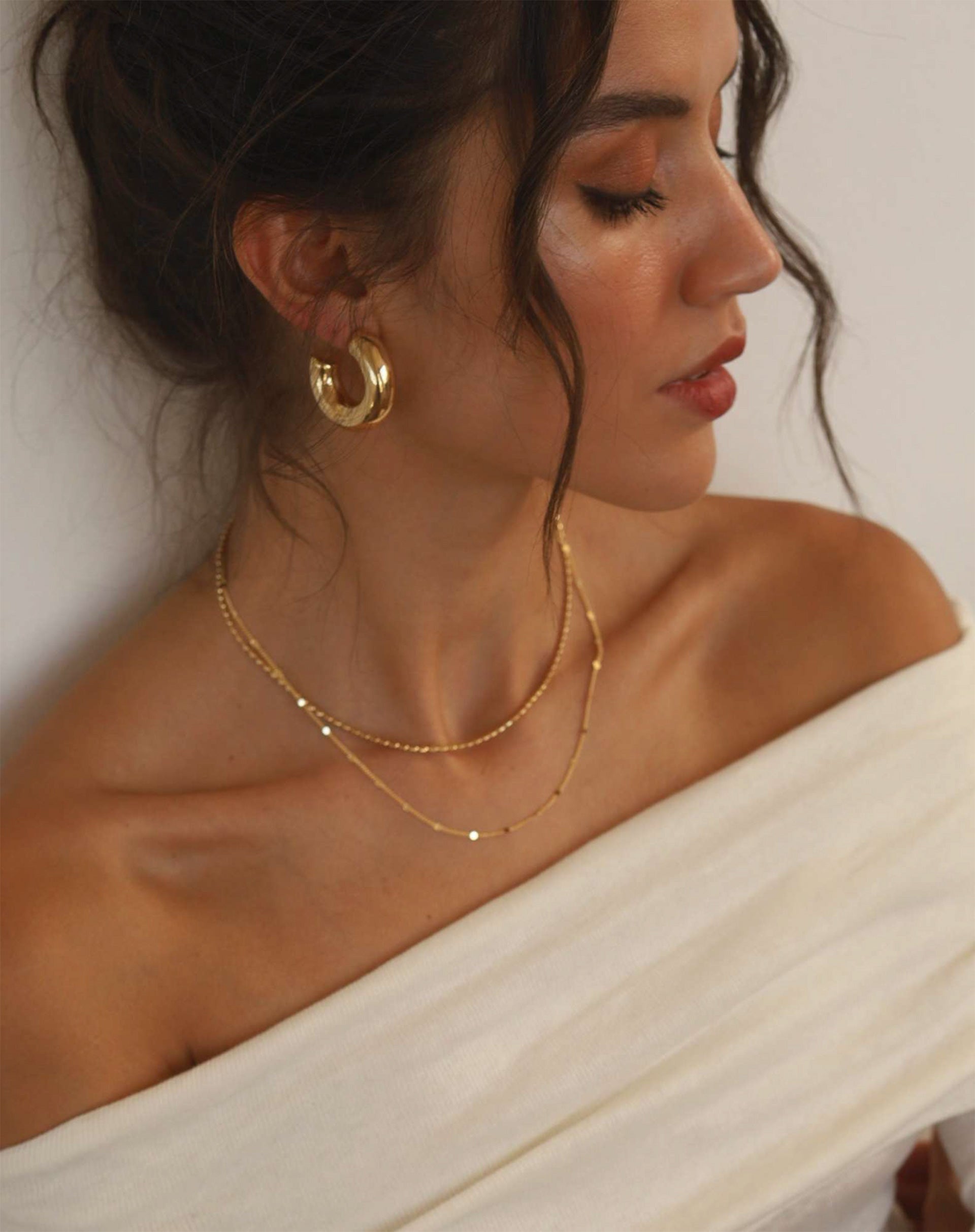 40015036_0009_argola-bold-grande-dourado-dourado_3_e47c5ca1-6cf6-4c08-8fc2-07d367c73358.jpg