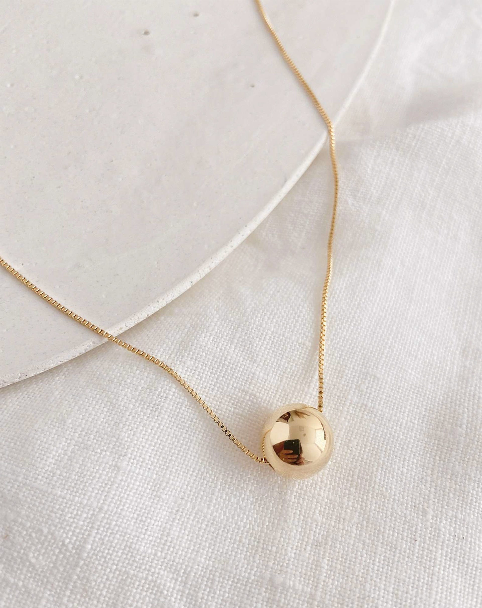 40015037_0009_colar-esfera-medio-dourado-dourado_0_40a372ce-6986-4347-b86b-47e58616658f.jpg