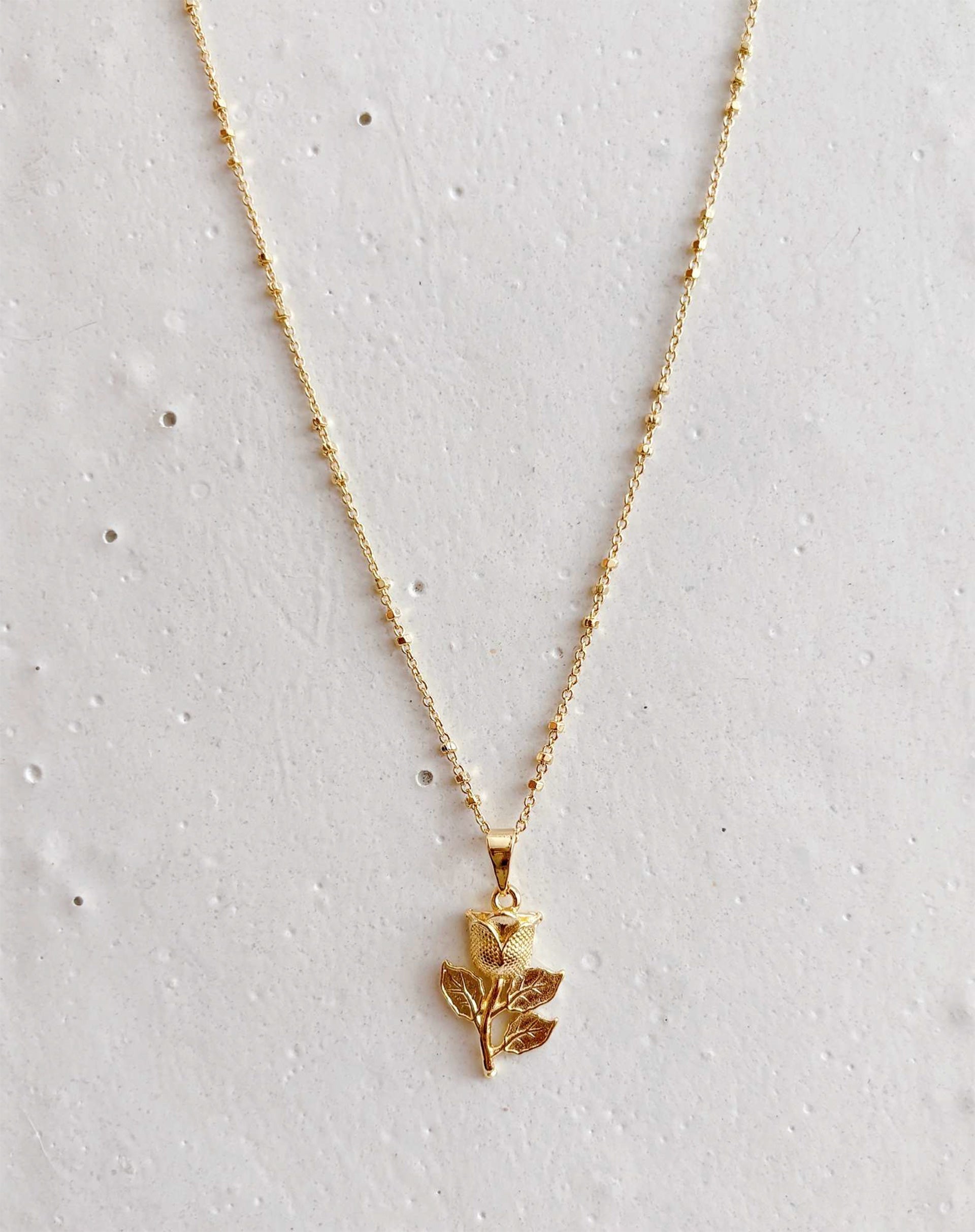 40015053_0009_colar-rosa-dourado-dourado_1_bfb31686-6519-4da6-b500-afd656bb280f.jpg