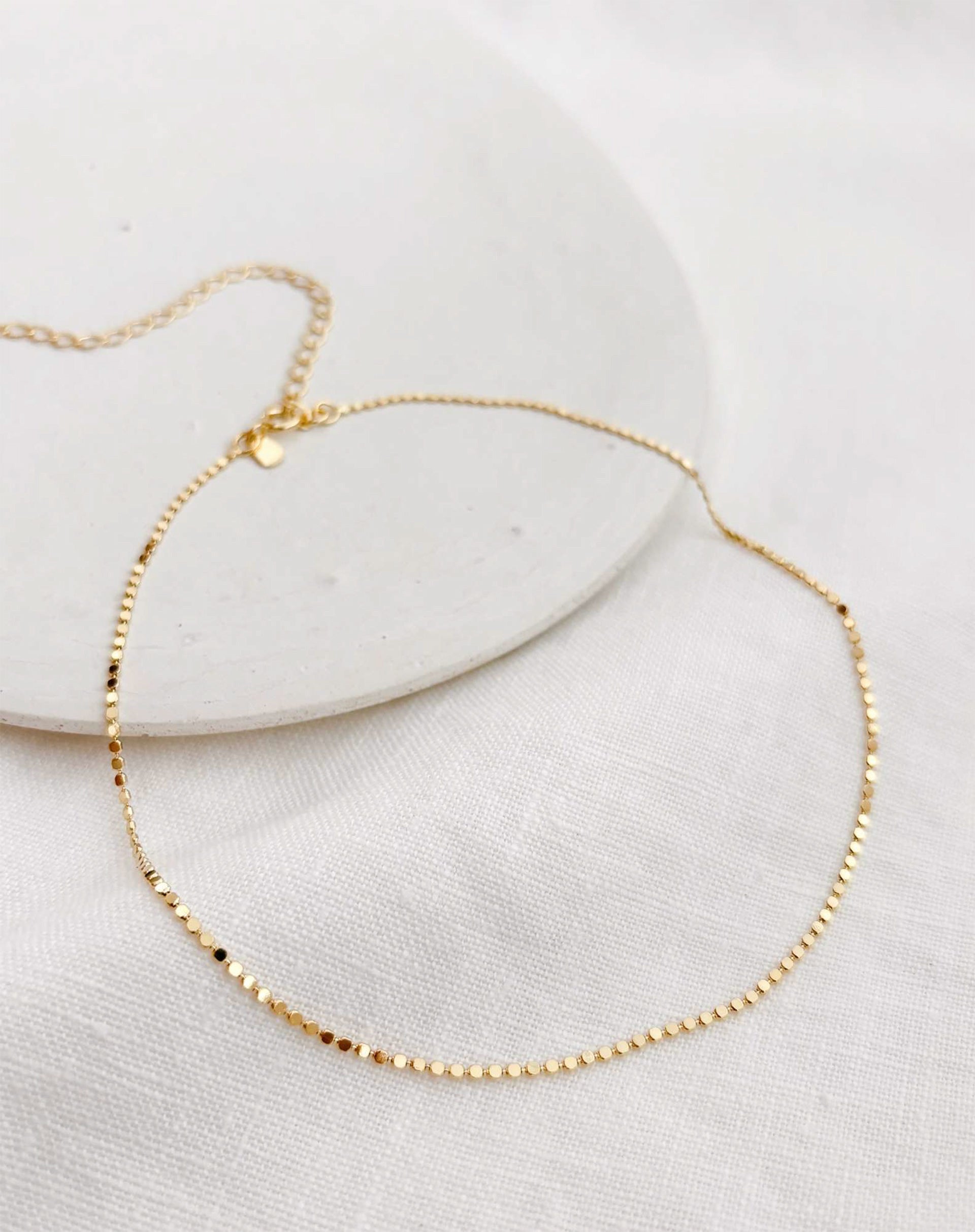 40015075_0009_gargantilha-dots-dourado-dourado_0_30d5b1a3-b74d-43c3-9a4b-72b997ed8278.jpg