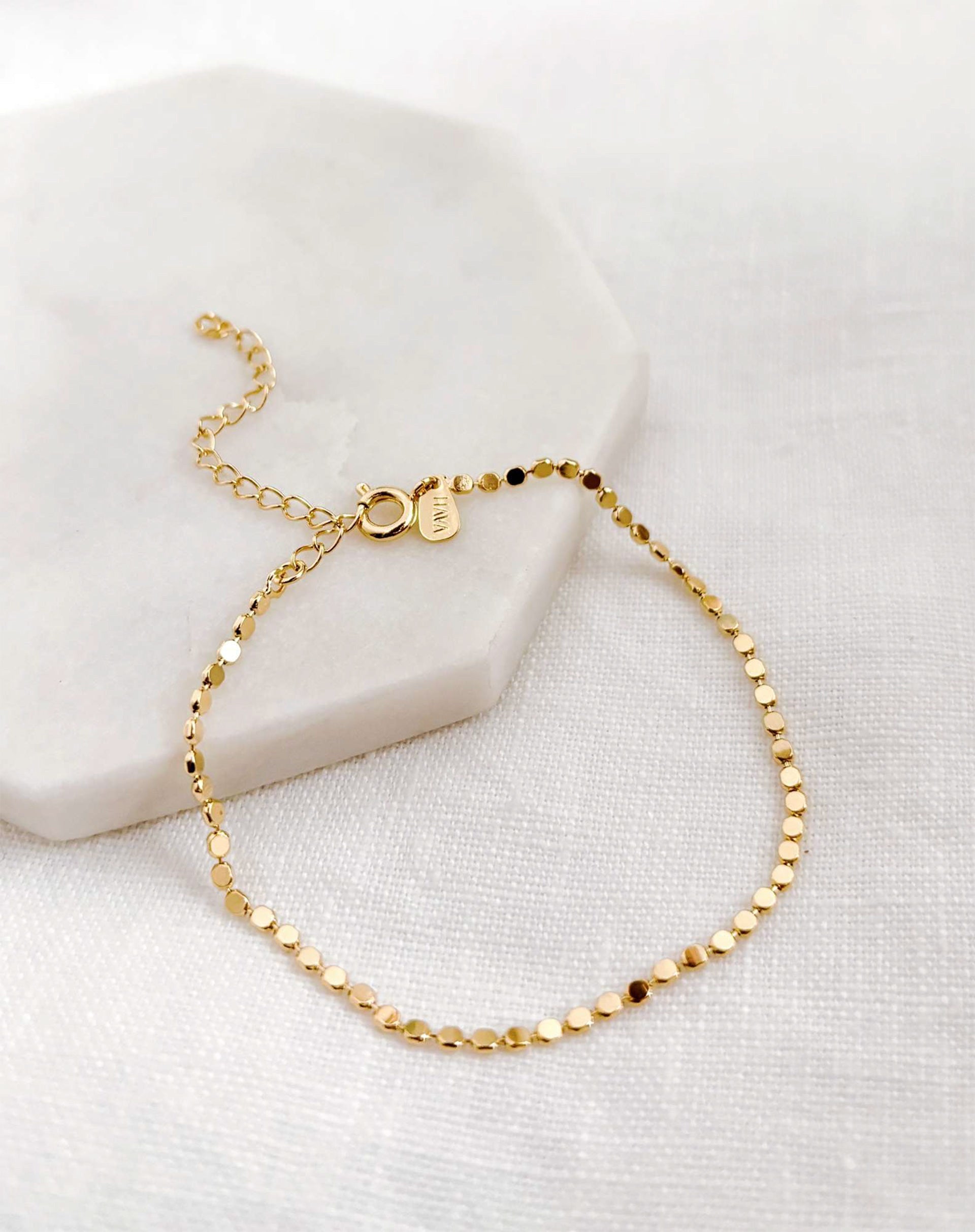 40015105_0009_pulseira-dots-dourado-dourado_0_37cf7ff0-35af-4bfe-8018-67fca9ee8126.jpg