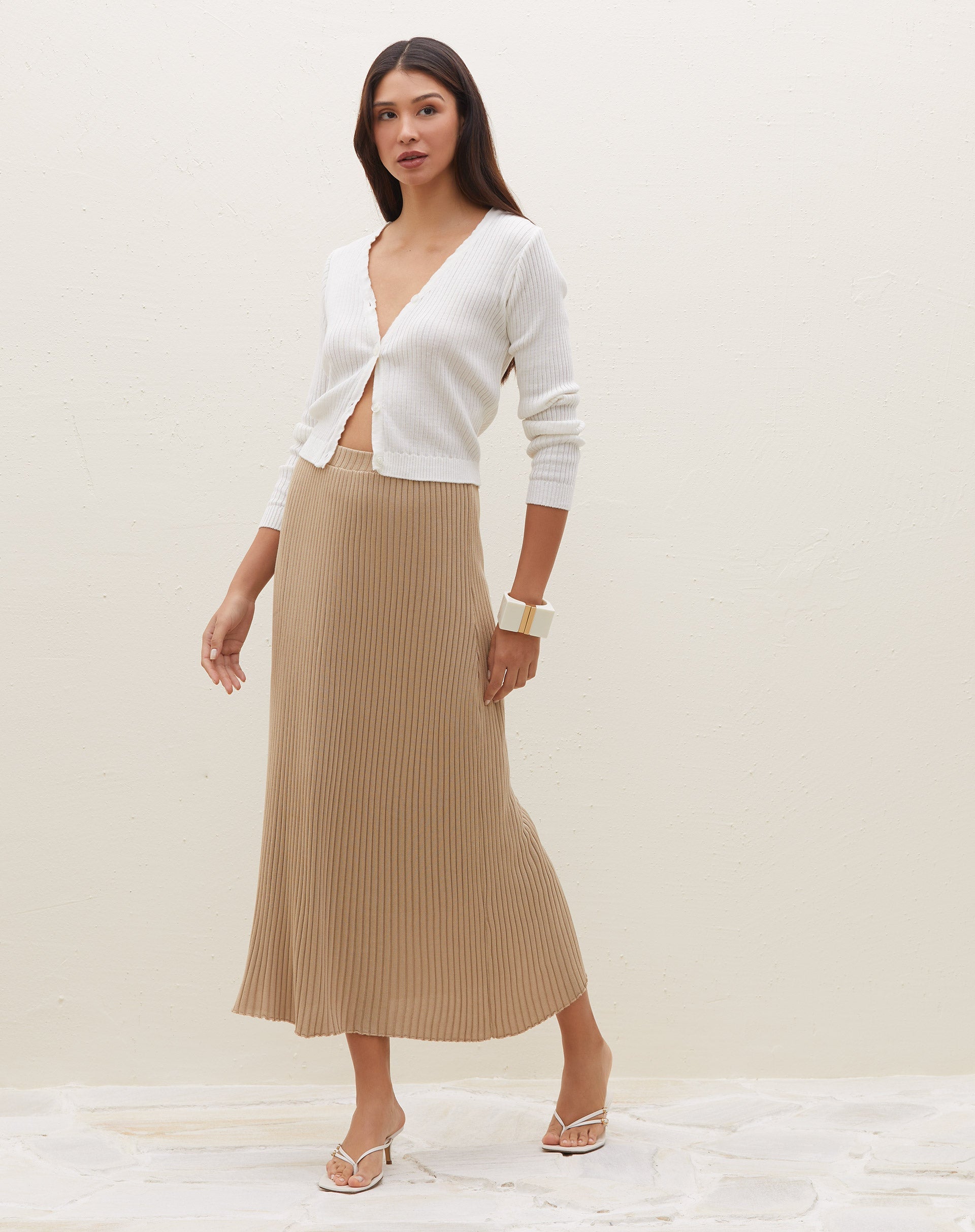 51225007_0006_saia-midi-de-tricot-com-costura-contrastante-bege_0_da5ec989-ada1-4735-bb0f-6524be8bf32c.jpg