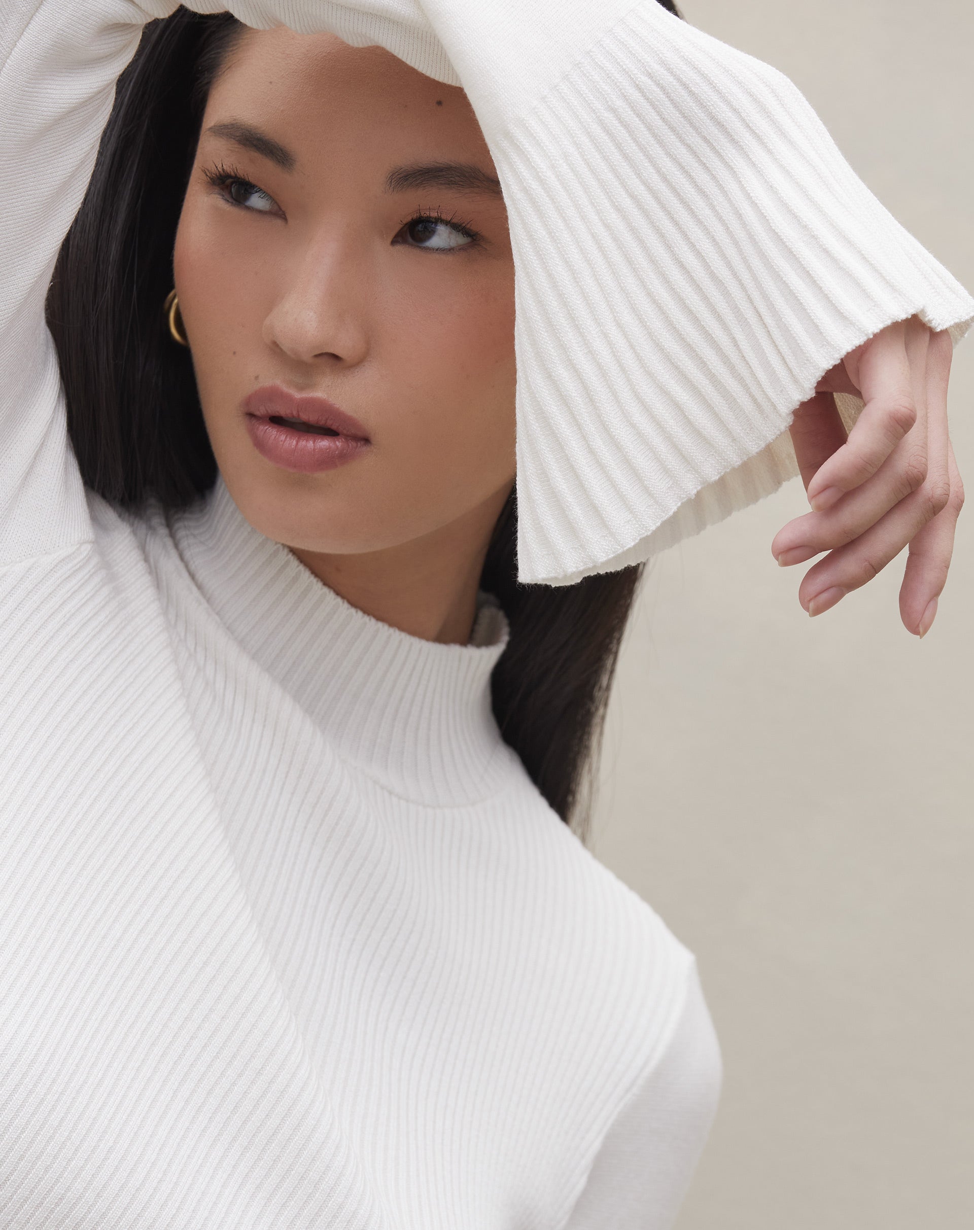 51225196_0029_sueter-de-trico-manga-sino-off-white_1_c6fe0a23-9b47-4de7-98f1-ca9adb41688b.jpg