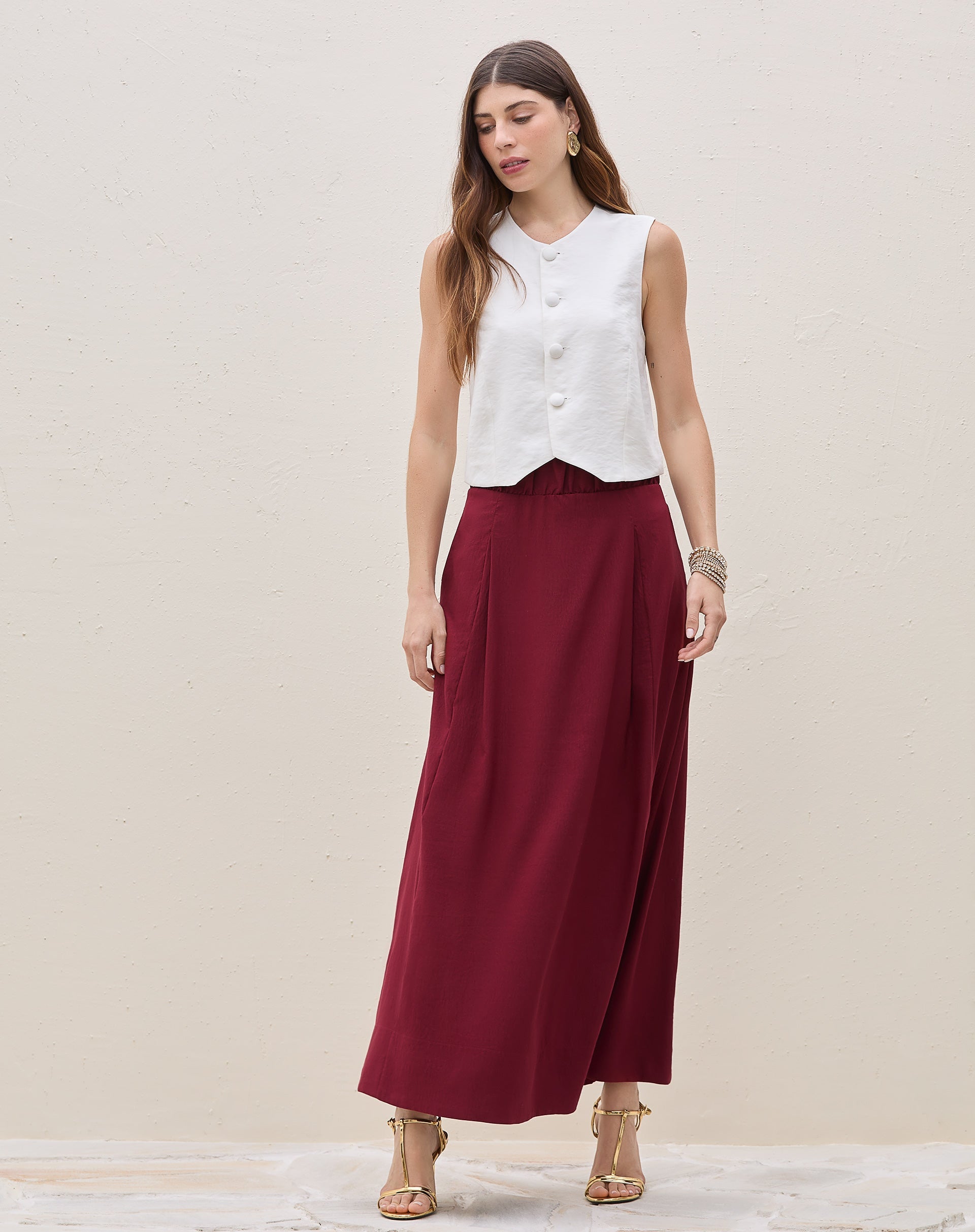 51225234_0123_saia-longa-com-cos-elastico-e-bolsos-vinho_0_65eff1a1-7127-4cfa-aa04-b49221d29f8a.jpg