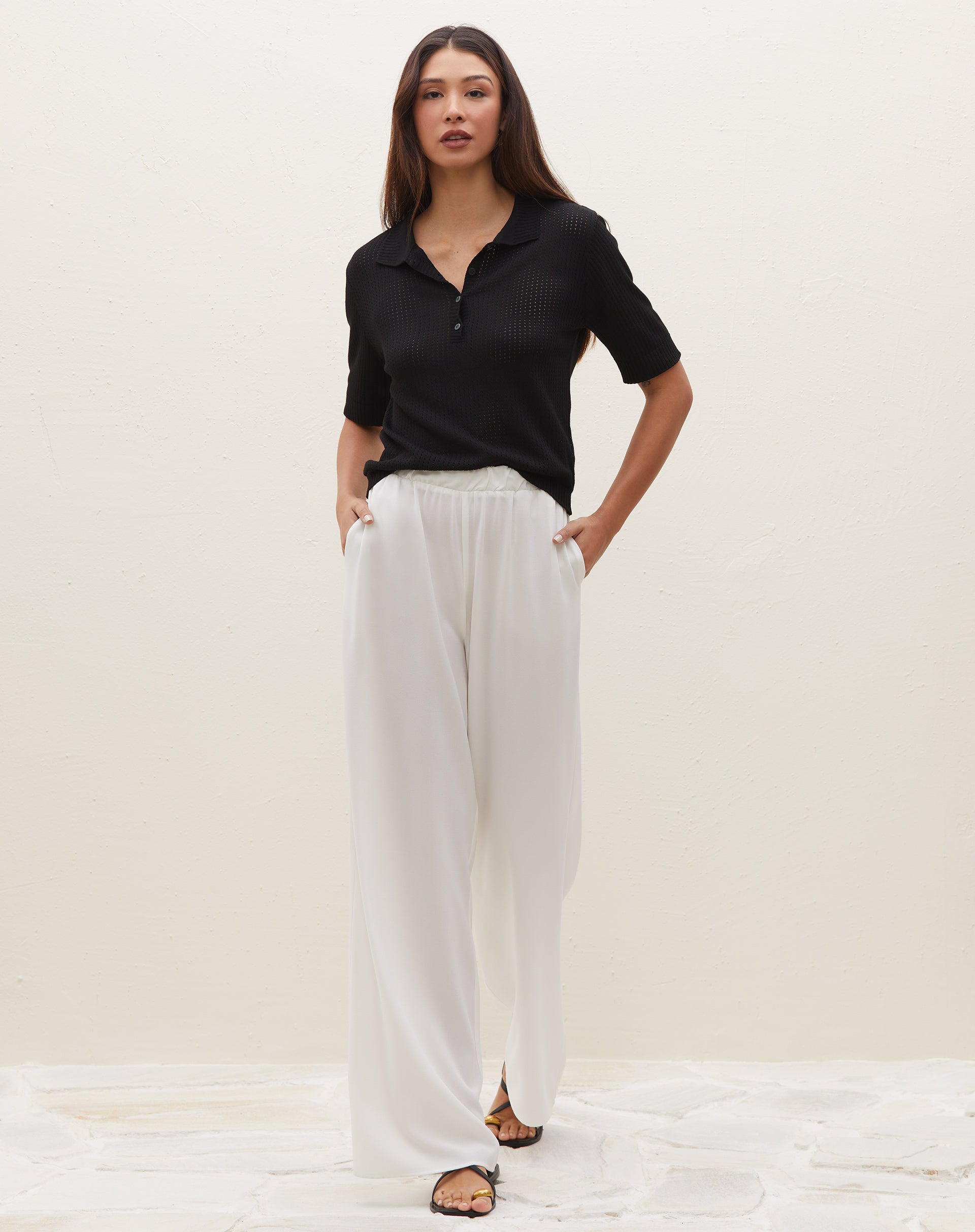51225955_0002_blusa-tricot-manga-curta-gola-polo-preto_1_faecd732-c607-4dd0-a8d4-f767ea034ad3.jpg