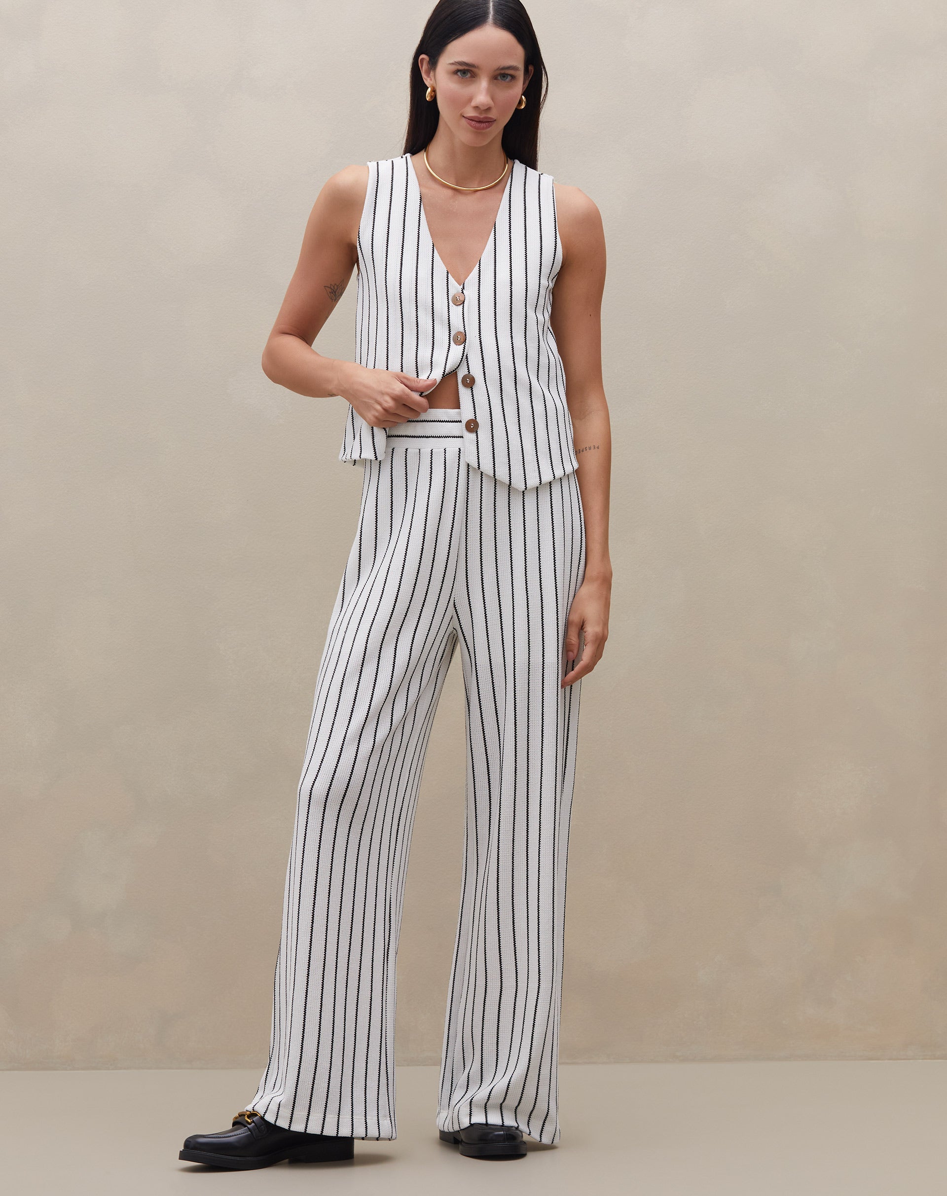 51226225_0029_calca-cintura-alta-de-malha-off-white_0_1b57164e-18b2-47a9-9111-623c3e7891e3.jpg