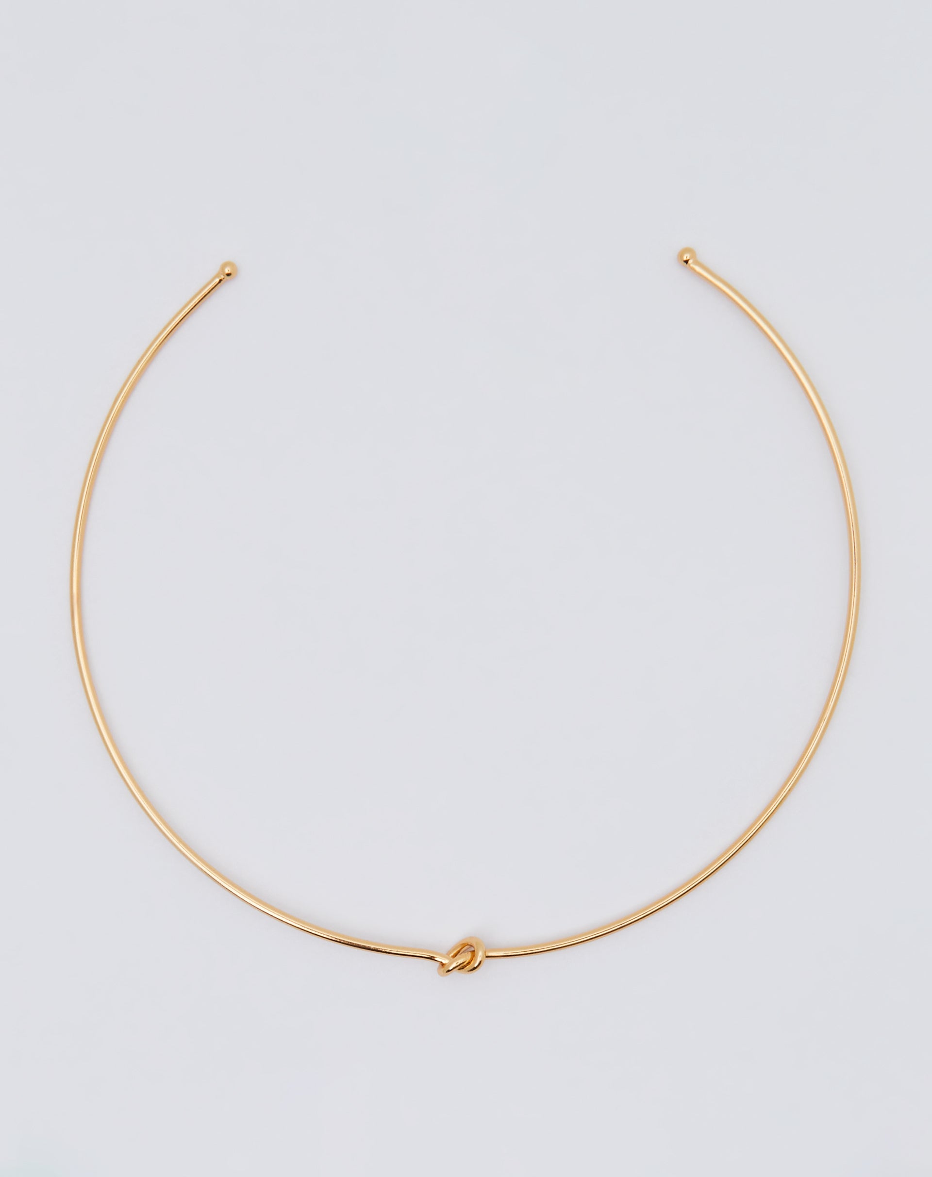 CHOKER DETALHE NÓ FOLHEADO - DOURADO